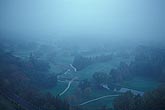 Fog impedes visibility in a valley