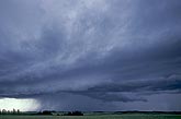 A storm pushes forward forming a shelf cloud