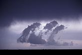 Scud clouds form in the outflow of a storm