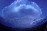 Fish-eye view of an immense Cumulonimbus storm cloud