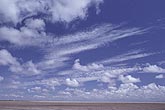 Cloud layers: high Altocumulus clouds with low Cumulus clouds