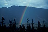 A mountain shower with a rainbow.