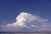 A small Cumulonimbus storm cloud in a dry atmosphere