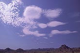 Lenticular Altocumulus clouds with crumbly elements