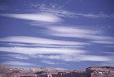 Elongated lenticular Altocumulus clouds over a plateau