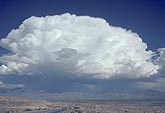 Cumulonimbus cloud formed by orographic lift over mountains