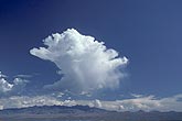 Virga from evaporation of the bases of dry desert Cumulus clouds