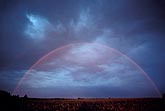 A red rainbow with a full high arc