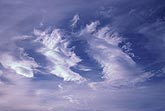 Tufts of cloud in an abstract skyscape