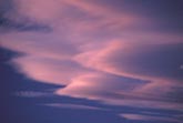 Heavenly sweeps of rosy pink clouds in an abstract cloudscape