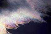 Iridescence paints the edge of clouds with color