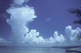 Castellated clouds over tropical waters on a warm and humid day