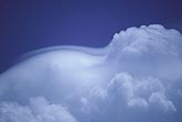 Pileus cloud from air flow bending over convective towers