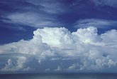 Boiling cloud bank of tropical thunderheads over ocean