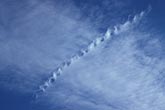 Rare condensation trail (contrail) and distrail from turbulent wake