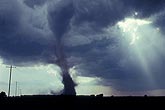 Tornado sequence: thick tapered funnel inside debris vortex