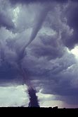 Tornado sequence: thinning funnel, tornado is beginning to weaken