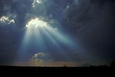Crepuscular rays stream down with heavenly light