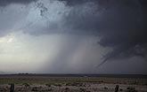 Long thin funnel cloud on a tornadic supercell