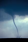 Long snaky tornado with slender condensation funnel