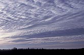 Cloud types, Ac: Altocumulus cloud sheet with bands and billows