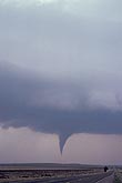 Tornado over open country at twilight