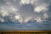 Anvil fallout and sinking air in a decaying storm