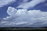 A Cumulonimbus regenerates, creating a vertical wall of cloud
