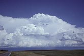 Frontal clouds, with a wall of convection rising on a cold front