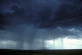 Rain shafts appear as showers propagate in a line on a storm base