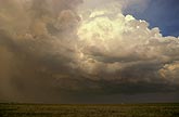 A storm threatens under a dark cloud