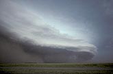 Straight-line winds with blowing dust under a storm Arcus