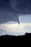 Condensation funnel cloud in the spinning vortex of a tornado