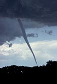 Smooth backlit tornado, elegantly curved