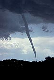 Close-up of a slender tornado with smooth funnel cloud