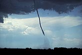 Tornado with a narrow funnel and a wide vortex