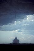 Tornado with short condensation funnel and dense black debris cloud