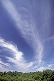 Cirrus cloud plumes sweep the sky