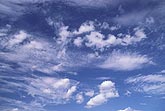 Scattering of small clouds with random arrangement of cloud elements