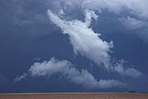 Why scud clouds form: turbulent mixing of moist air