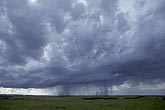 Flow of air around a storm cloud as separate cells form and rain