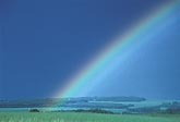 Close rainbow with supernumerary arcs in falling rain