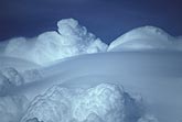 Multiple Pileus clouds are blended into a thick gray sheet