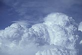 An upwelling of cloud distorts the flow of air, creating Pileus