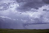 Inflow meets outflow under a storm, with heavy rain and a rain foot