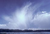 Convective snow shower clouds with frozen furry anvil