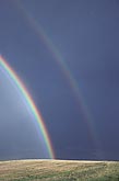 A bright double rainbow (with paler secondary rainbow)