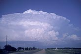 Close-up of a distant supercell storm cloud with overshoot