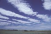 Cloud types, Ac: Altocumulus cloud strips. Large scale billow pattern