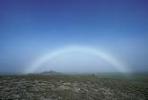 A fog bow produced by reflected sunlight on tiny water droplets